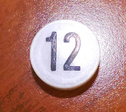 INSERT, BUTTON, 7/8 DIA., WHITE, MARKED # 12 IN BLACK ARMOR # 11133-01