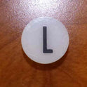INSERT, BUTTON, 7/8 DIA., WHITE, MARKED L IN BLACK ARMOR # 11133-01