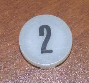 INSERT, BUTTON, 7/8 DIA., WHITE, MARKED 2 IN BLACK ARMOR # 11133-01