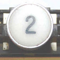 BUTTON, ASSEMBLY, WHITE WITH BLACK # 2 HORIZONTAL  ARMOR # B761003