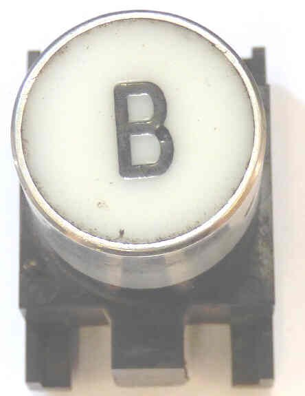 BUTTON, TOP, WHITE WITH BLACK VERTICAL B ARMOR # B761007