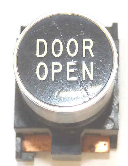 BUTTON, TOP, BLACK WITH WHITE VERTICAL DOOR OPEN ARMOR # B761007