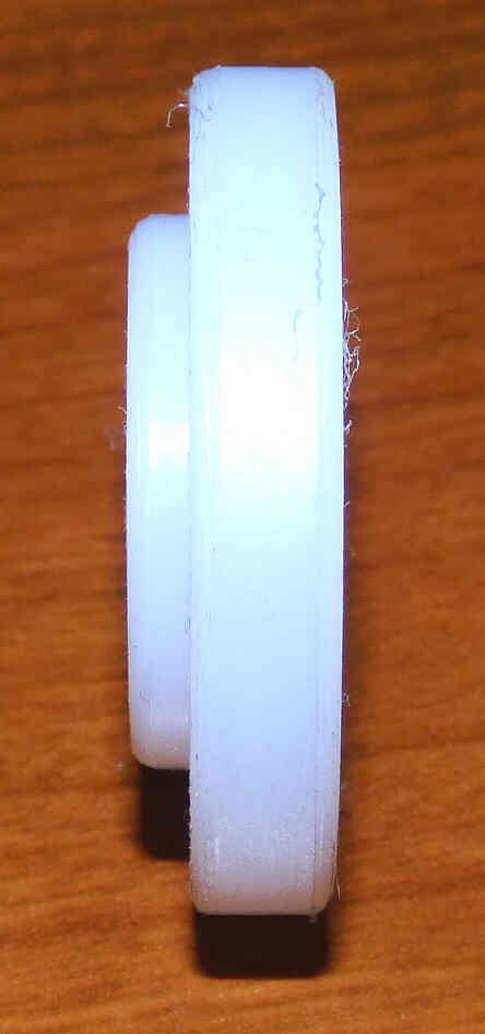 INSULATOR, 1 1'2 X 1/4 BASE, 1 X 1/8 BOSS, 1/2 HOLE
