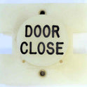 PRESSEL, BUTTON, MONITOR, WITH CONTACTS, WHITE, MARKED 'DC'  IN BLACK