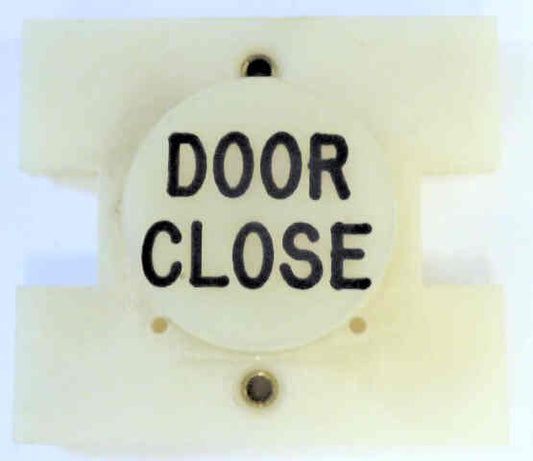 PRESSEL, BUTTON, MONITOR, WITH CONTACTS, WHITE, MARKED 'DC'  IN BLACK