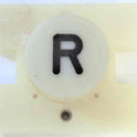 PRESSEL, BUTTON, MONITOR, WITH CONTACTS, WHITE, MARKED 'R'  IN BLACK