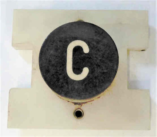PRESSEL, BUTTON, MONITOR, WITH CONTACTS BLACK, MARKED 'C'  IN WHITE