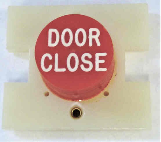 PRESSEL, BUTTON, MONITOR, EXTENDED BUTTON , RED, MARKED 'DC'  IN WHITE