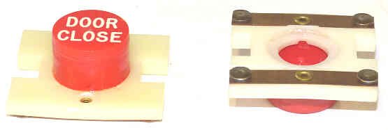 PRESSEL, BUTTON, MONITOR, EXTENDED BUTTON , RED, MARKED 'DC'  IN WHITE