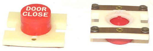 PRESSEL, BUTTON, MONITOR, EXTENDED BUTTON , RED, MARKED 'DC'  IN WHITE