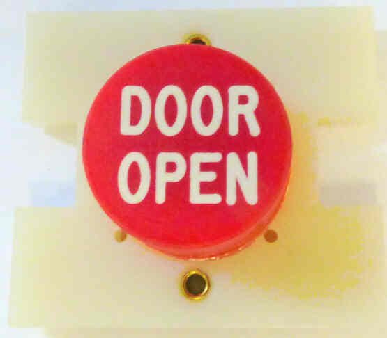 PRESSEL, BUTTON, MONITOR, EXTENDED BUTTON , RED, MARKED 'DO'  IN WHITE