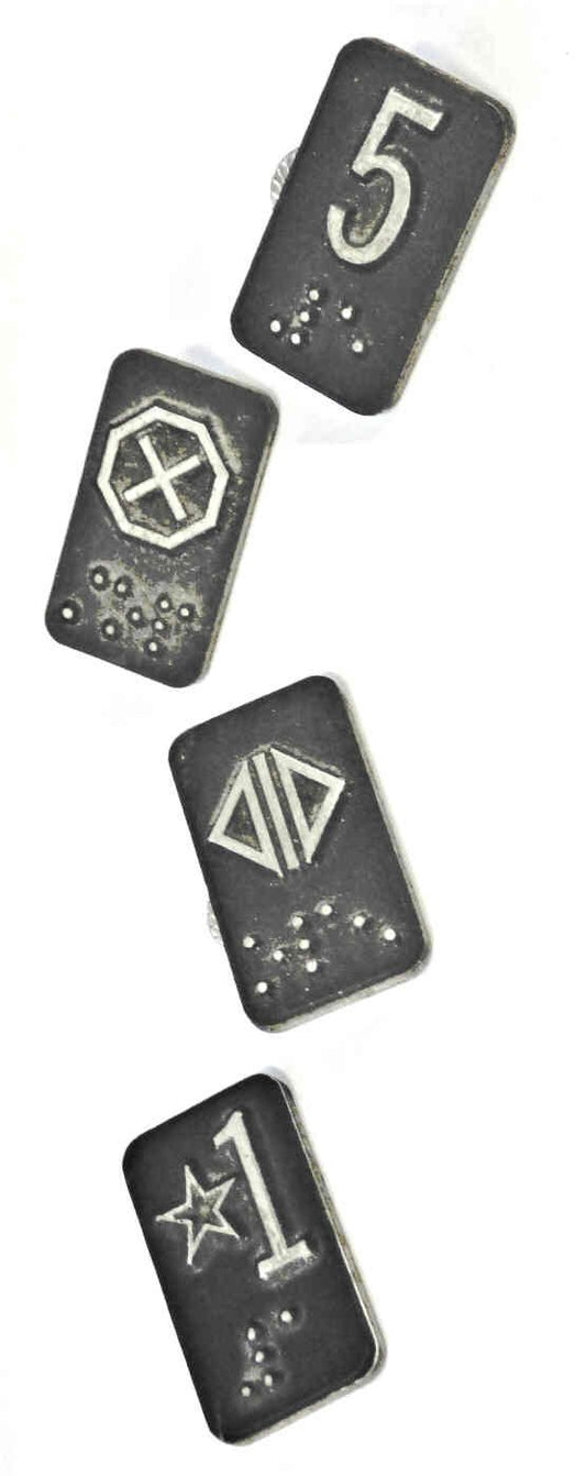 PLATE, BRAILLE, STUD TYPE, 1 3/8 X 3/4 SPECIFY  MARKING