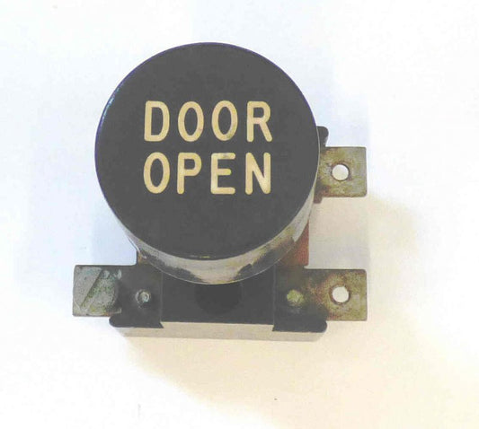 BUTTON, ASSEMBLY, BLACK. MARKED DOOR OPEN, 1 X 3/4 ARMOR # B761004A