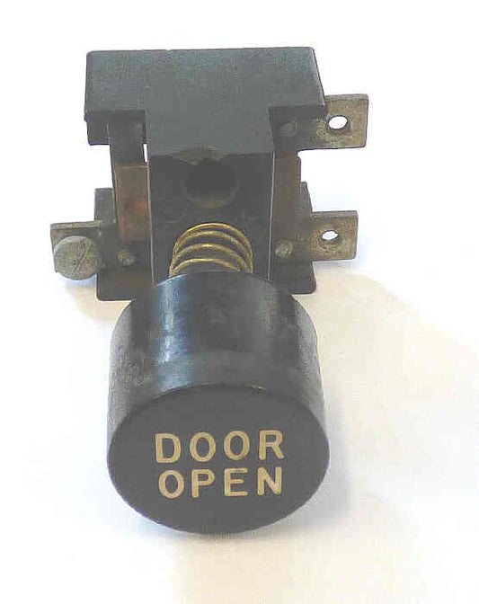 BUTTON, ASSEMBLY, BLACK. MARKED DOOR OPEN, 1 X 3/4 ARMOR # B761004A
