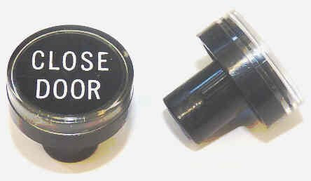 BUTTON, CLEAR CAP, 1 DIAMETER, MARKED DOOR CLOSE OTIS # A323BD1-DC