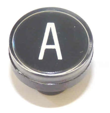 BUTTON, CLEAR CAP, 1 DIAMETER, MARKED 'A' OTIS # A323BD1-A