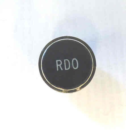 BUTTON, CLEAR CAP, 1 DIAMETER, MARKED RDC OTIS # A323BD1-RDC