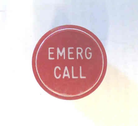 BUTTON, CLEAR CAP, 1 DIAMETER, MARKED EMERG CALL IN RED OTIS # A323BD7-EC