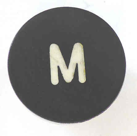 BUTTON, BLACK, MARKED M, 1 DIAMETER OTIS # 323BD1-M