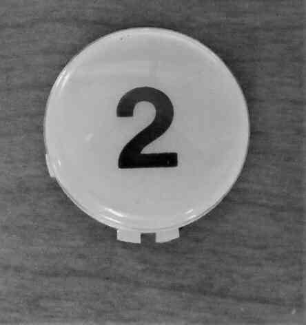 BUTTON. INSERT, ADA RAISED HEIGHT, MARKED # 2 SCHINDLER # 6947C16H02