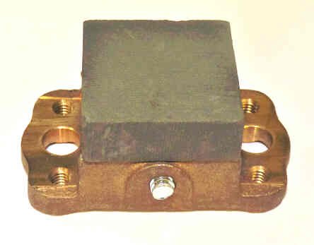 HOLDER, 1.5 X 1.5 CARBON IN HOLDER CASTING 4SW3 OTIS # 12138