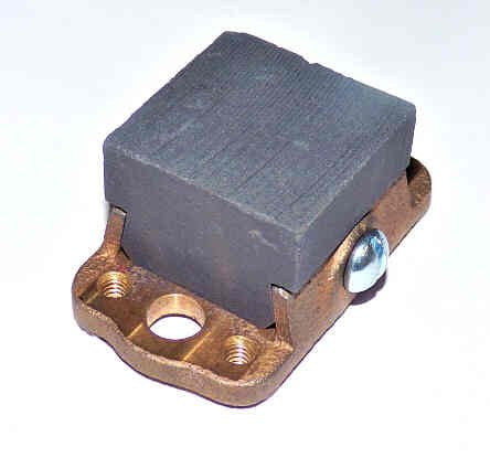 HOLDER, 1.5 X 1.5 CARBON IN HOLDER CASTING 4SW3 OTIS # 12138