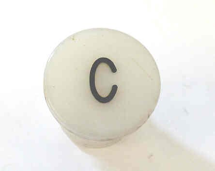 BUTTON, WHITE, TYPE 'H', MARKED 'C' IN BLACK HAUGHTON # 3-40080-C