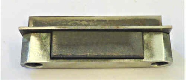 ASSEMBLY, GIB, SPRING LOADED, CAST, PHOSPOR SPRING CARBON INSERTS OTIS # 385B1