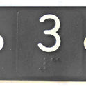 PLATE, BRAILLE, 1 1/4 SQUARE MOUNTED ON 2.25 X 1.5 BACK MARKED 3
