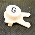 BUTTON, WHITE, ENGRAVED, BLACK 'G' DOVER # 106734