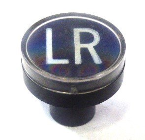 BUTTON, CLEAR CAP, 1 DIAMETER, MARKED LR OTIS # A323BD1-LR