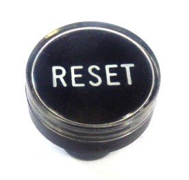BUTTON, CLEAR CAP, 1 DIAMETER, MARKED RESET OTIS # A323BD1-RESET