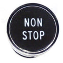 BUTTON, CLEAR CAP, 1 DIAMETER, MARKED NON STOP OTIS # A323BD1-NS