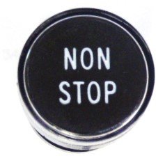 BUTTON, CLEAR CAP, 1 DIAMETER, MARKED NON STOP OTIS # A323BD1-NS