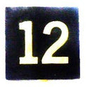 BUTTON, 7/8 SQUARE, MARKED # 12 OTIS # 323AS2
