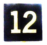 BUTTON, 7/8 SQUARE, MARKED # 12 OTIS # 323AS2