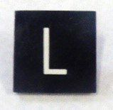 BUTTON, 7/8 SQUARE, MARKED L OTIS # 323AS2