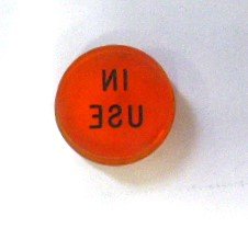 JEWEL, ORANGE, 7/8 DIAMETER, ENGRAVED 'IN USE ON REAR OTIS # 499Z7