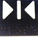 INSERT, METAL,DOOR CLOSE SYMBOL 7069AF SERIES OTIS # AAA250G1-IDC2