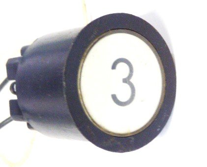 PUSHBUTTON, BLACK, ROUND, WHITE INSERT, MARKED 3 US # 167-03011-100