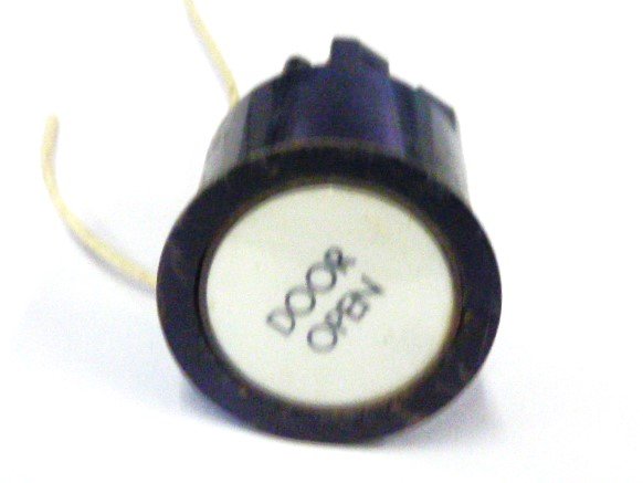 PUSHBUTTON, BLACK, ROUND, WHITE INSERT, MARKED DOOR OPEN  US # 167-03011-100