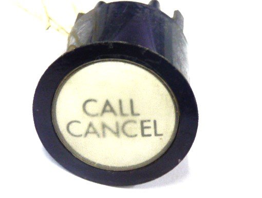 PUSHBUTTON, BLACK, ROUND, WHITE INSERT, MARKED CALL CANCEL  US # 167-03011-100
